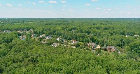 Aerial top view of small residential area a Monroe small town in on between the forest landscape New Jersey US