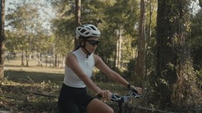 cyclist girl training. Cyclist Woman in Helmet on Bike