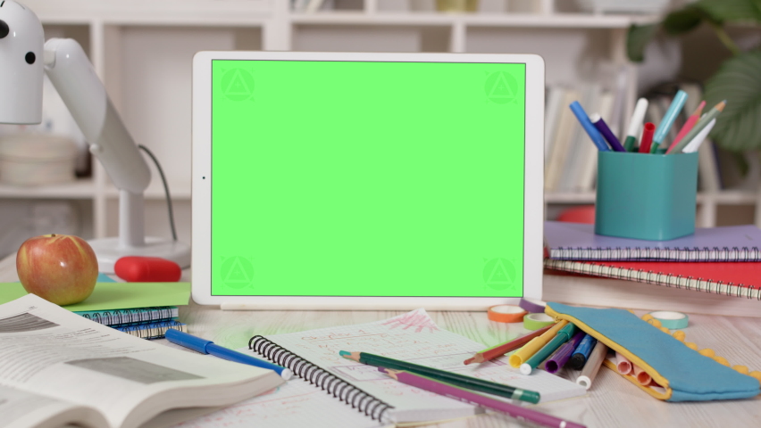 Tablet Computer with Green Screen in Cozy Student Room Interior Royalty-Free Stock Footage #1088345133