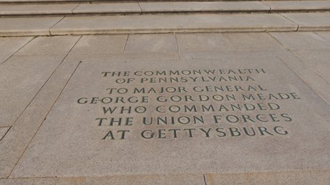 Washington, DC - USA - March 11 2022: The George Gordon Meade Memorial, a statue honoring the Union General in the American Civil War.  The camera makes a tilt-up motion from an inscription. 