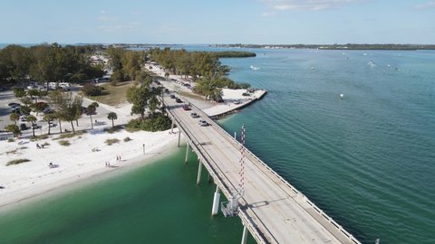 aerial zooming over Longboat Pass Bridge, looking toward Cortez from Longboat Pass in Sarasota, Florida