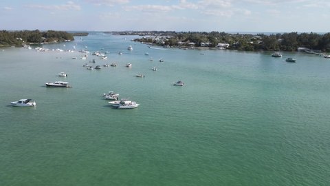 aerial, sandbar social, boaters in Sarasota, Florida relax near Jewfish Key