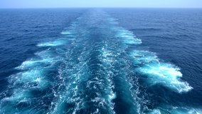Wake of vessel. Wide wake trail from boat. Back view. Ocean water. Deep blue. Trace from large ship. - Powered by Shutterstock - Get 15% off with code: PIKWIZARD15