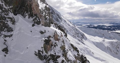 Aerial shot of the mountains of Mayflower Gulch, CO in the winter