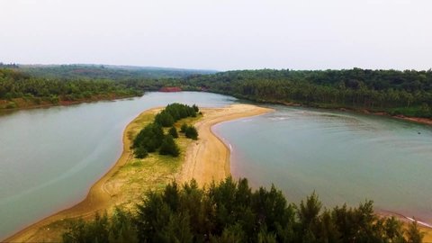 A drone shot flying over Galgibagh beach in south Goa, India.