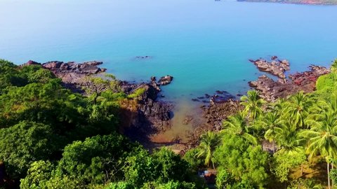 A beautiful drone shot of the rock in the sea at cabo de rama in south Goa, India.