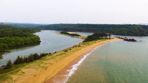 A drone view of beautiful river and beach of Galgibagh in south of Goa,India.