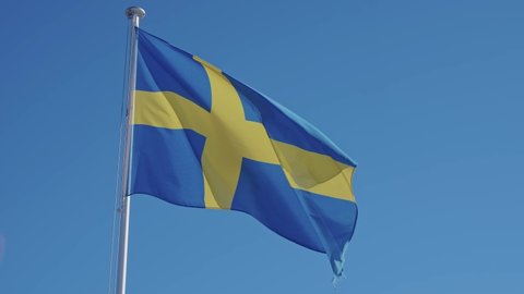 Flag of Sweden. National flag of Sweden waving in the wind on a clear day.