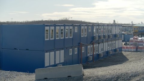Newly Constructed Building With Outdoor Airconditioning Units Installed On The Exterior. sideways shot