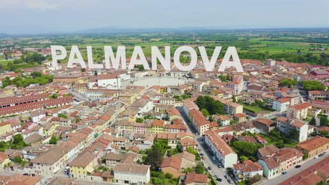 Inscription on video. Palmanova, Udine, Italy. An exemplary fortification project of its time was laid down in 1593. Glitch effect text, Aerial View, Point of interest