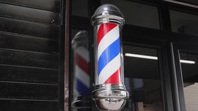 Barber Pole Retro Swirl Sign at Hairdresser Shop