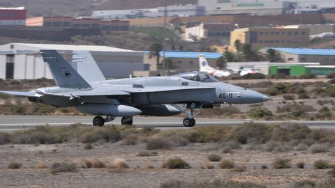 Gran Canaria Gando Military Air Base Spain OCTOBER, 21, 2021 Fighter jet plane landing on military airbase airport runway. Boeing F-18 Hornet of Spanish Air Force