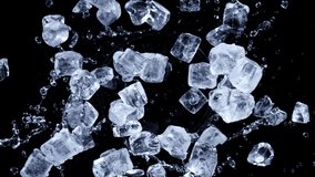 Super slow motion shot of rotating exploded Ice Cubes and splashing water on black at 1000fps. - Powered by Shutterstock - Get 15% off with code: PIKWIZARD15
