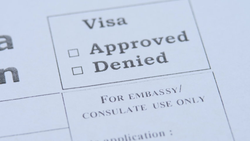 Stamping approved visa decision. Paper application form to travel or immigration. Embassy officer check document. Permission for foreigner country. Success interview. Emigration and immigration Royalty-Free Stock Footage #1088413731