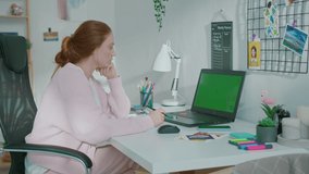 Female designer disagrees with her companion in a videoconference