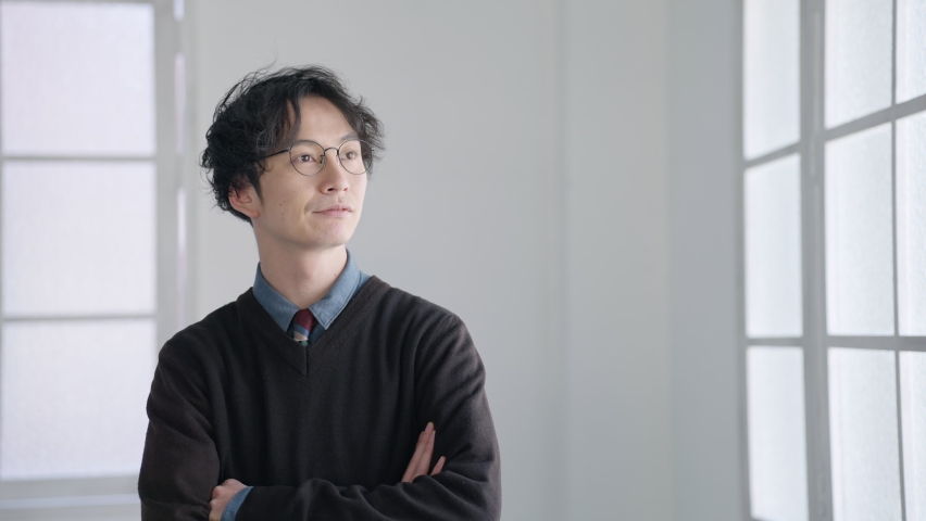 Asian man thinking at home | Shutterstock HD Video #1088417161