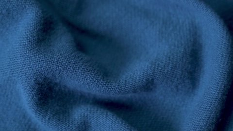 Texture of Dark Blue Woolen Fabric, Material, Clothes, Cozy Plaid, Macro, Close-up. Sewing Factory. Wool Clothing Store. Blue Wool Background.