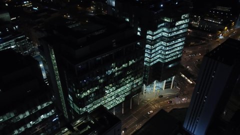 BIRMINGHAM, UK - 2022: Aerial view of Birmingham UK at night tall office buildings 