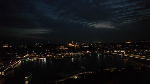 Night time drone view of the historical peninsula in illuminated night view of Istanbul, the Suleymaniye Mosque and other touristic places of drone footage