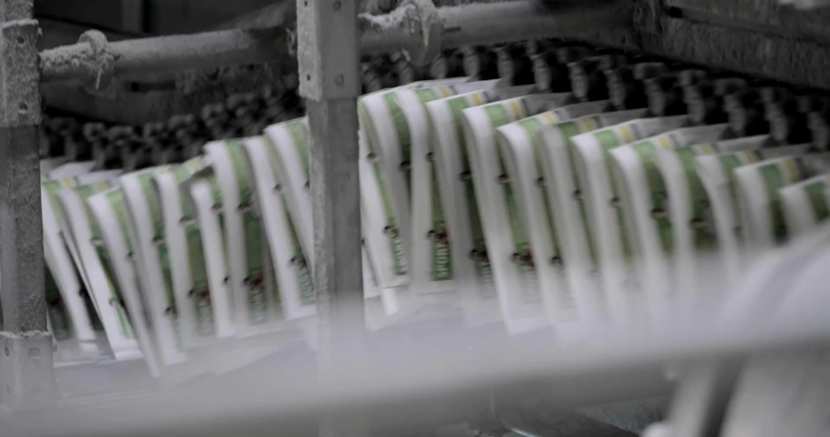 Newspaper printing at a plant. Newspaper printed on a printing house machine Print plant factory. Royalty-Free Stock Footage #1088435515