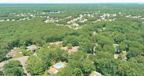 Scenic seasonal landscape from above aerial top view of a small town in countryside in Monroe New Jersey USA