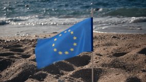 European Union EU flag in sea in the background. Concept for traveling and tourism in Europe. - Powered by Shutterstock - Get 15% off with code: PIKWIZARD15