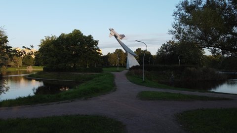 Monument to military pilots stella with MIG19 fighter in Aviators park. 