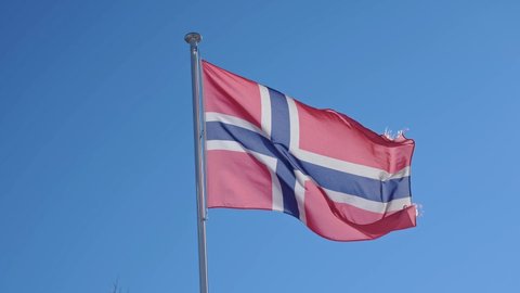Flag of Norway. National flag of Norway waving in the wind on a clear day.