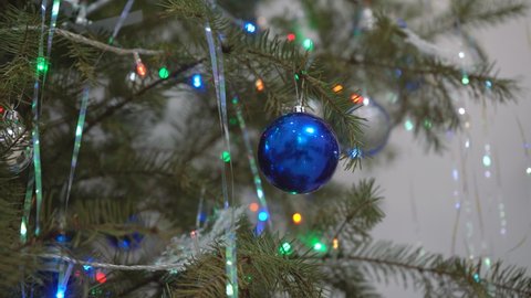 round blue ball on the Christmas tree. close-up