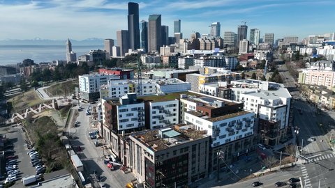Cinematic 4K aerial drone pedestal shot of First Hill, Yesler Terrace, Atlantic, Cherry Hill, Squire Park, Central District downtown Seattle, Washington
