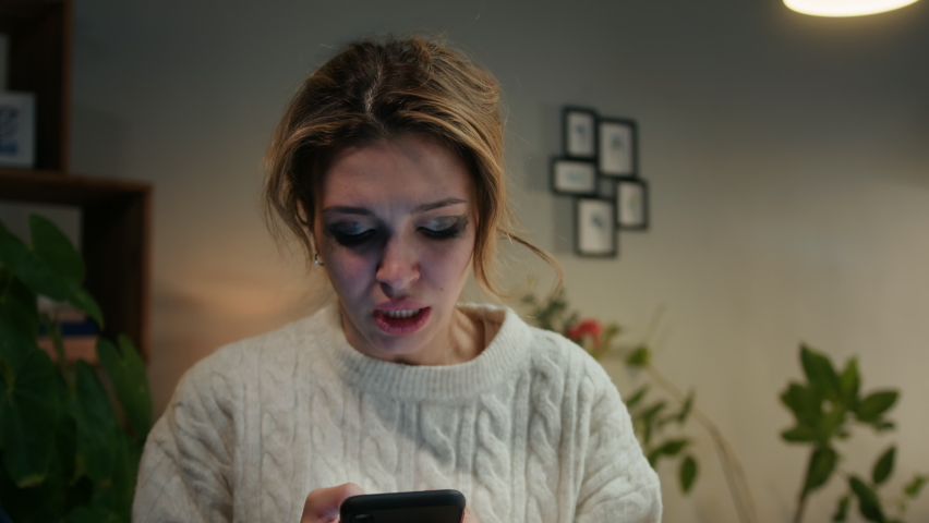 Crying woman calling helpline, Irritated emotional man shouting, husband screaming at his wife, feeling anger and stress, bad mood. Family problems, domestic violence. | Shutterstock HD Video #1088447309