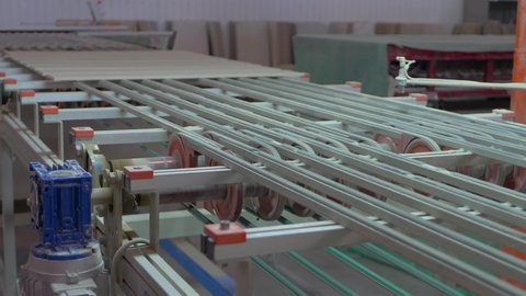 Made ceramic tiles, manufacture process. Conveyor belt systems
