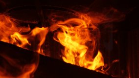 Super slow motion flames in the fireplace. Video HD