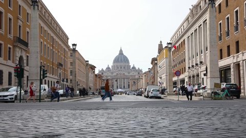 Time lapse of Saint Peter Basilica in the Vatican, the church of the Pope, from Via della Conciliazione, a street within Rome, Italy. It connects Castel Sant'Angelo to the Saint Peter's Square