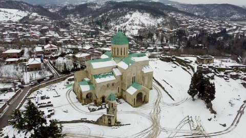 Aerial rotate view of Bagrati Cathedral in Kutaisi, Georgia. Cathedral of the Dormition, or the Kutaisi Cathedral is an 11th-century cathedral in the city of Kutaisi.
