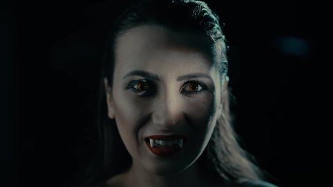 Vampire woman in the dark