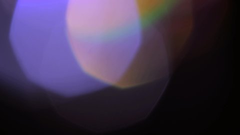 Light Leaks abstract 4K footage. Moving blinking circle lens glow flare bokeh overlays natural animation defocused blurred color background. Compositing over your project, stylizing video, transitions