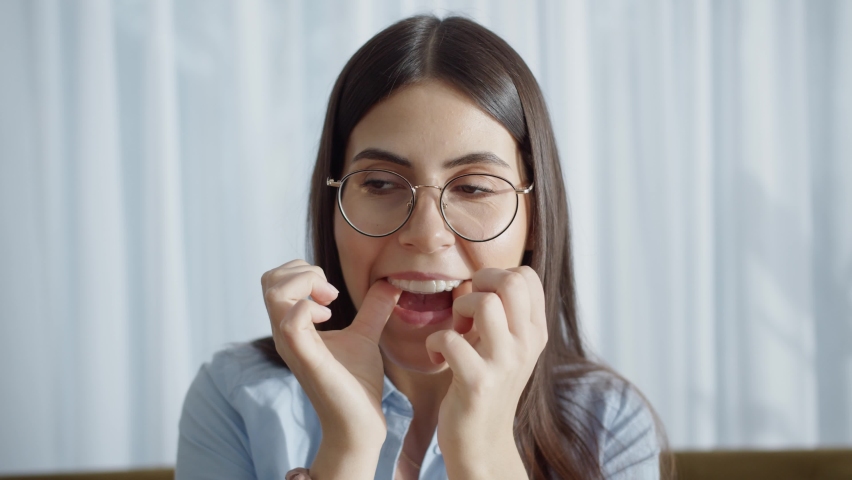 Happy Attractive Woman Smiles And Sitting In Cozy House And Holding Invisalign Braces. Putting On Transparent Plastic Retainers Or Tooth Whitening System. Concept Of Dental Healthcare And Orthodontic Royalty-Free Stock Footage #1088478437