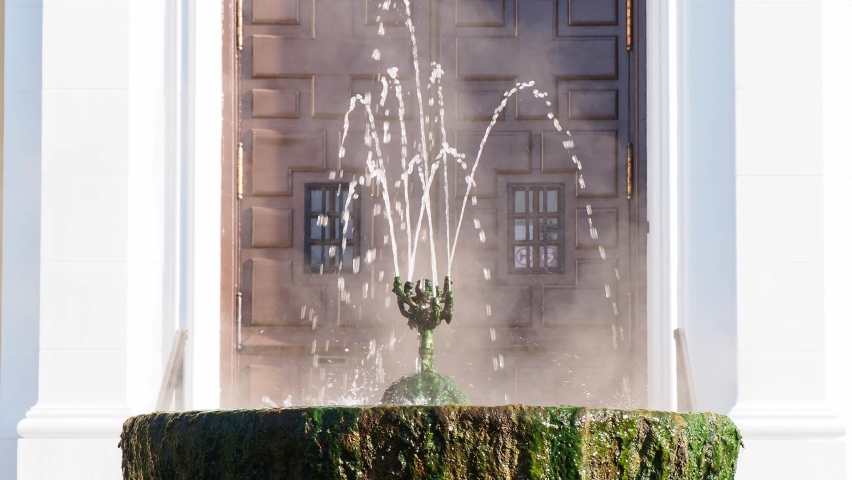 Sunny view of an old Fountain in front of the administration building at Arkansas