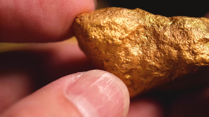 The miners carried the pure gold in their hands found in the mine into consideration.	