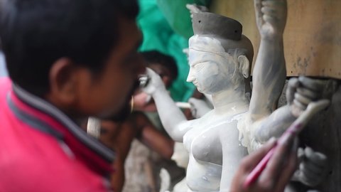 Making of of an idol of Hindu goddess Durga at Kumartuli in Calcutta, West Bengal, India.