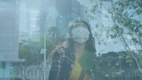 Animation of medical data processing over biracial woman in face mask using smartphone. global science, connections and data processing during covid 19 pandemic concept digitally generated video. - Powered by Shutterstock - Get 15% off with code: PIKWIZARD15