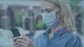 Animation of medical data processing over caucasian woman in face mask using smartphone. global science, connections and data processing during covid 19 pandemic concept digitally generated video. - Powered by Shutterstock - Get 15% off with code: PIKWIZARD15