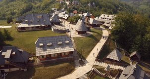 Aerial Footage Panoramic View of the Drvengrad, traditional wooden village in Serbia