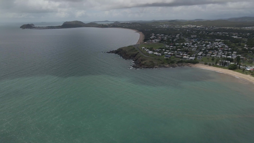 Flying Towards Rugged Shore Of Yeppoon Coastal Town In Queensland, Australia. Aerial Drone Shot
