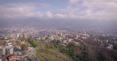 Aerial view of Caracas City, over Colinas de Bello Monte, looking to the Avila Mountain in the background.
