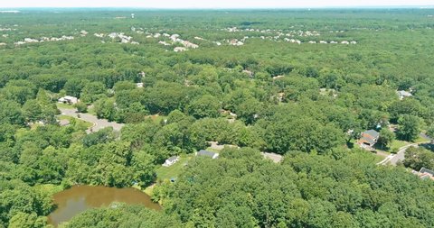 Panorama top view on between forest landscape residential neighborhood district in American town, in Monroe New Jersey USA