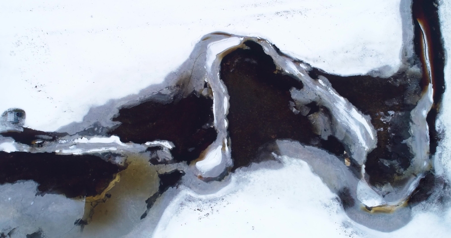 Descending above springtime flooded river in Estonia