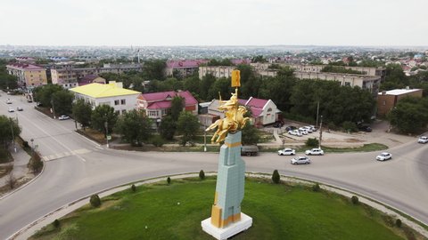 Drone view of the Golden Horseman monument. The hero of the folk epic Dzhangar, located in the capital of the Republic of Kalmykia - JULY 07, 2021 Elista, Russia
