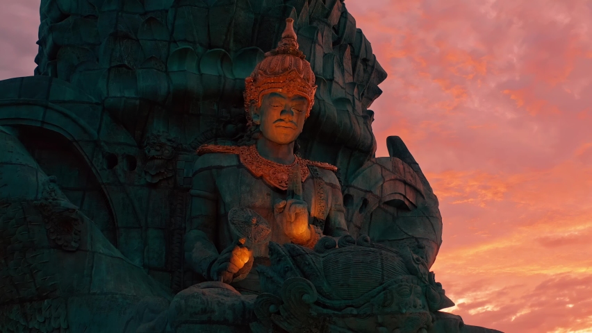 Bali's Most Iconic Landmark Hindu God Garuda Wisnu Kencana statue also GWK statue is a 122-meter tall statue located in Garuda Wisnu Kencana Cultural Park, Bali, Indonesia | Shutterstock HD Video #1088525507